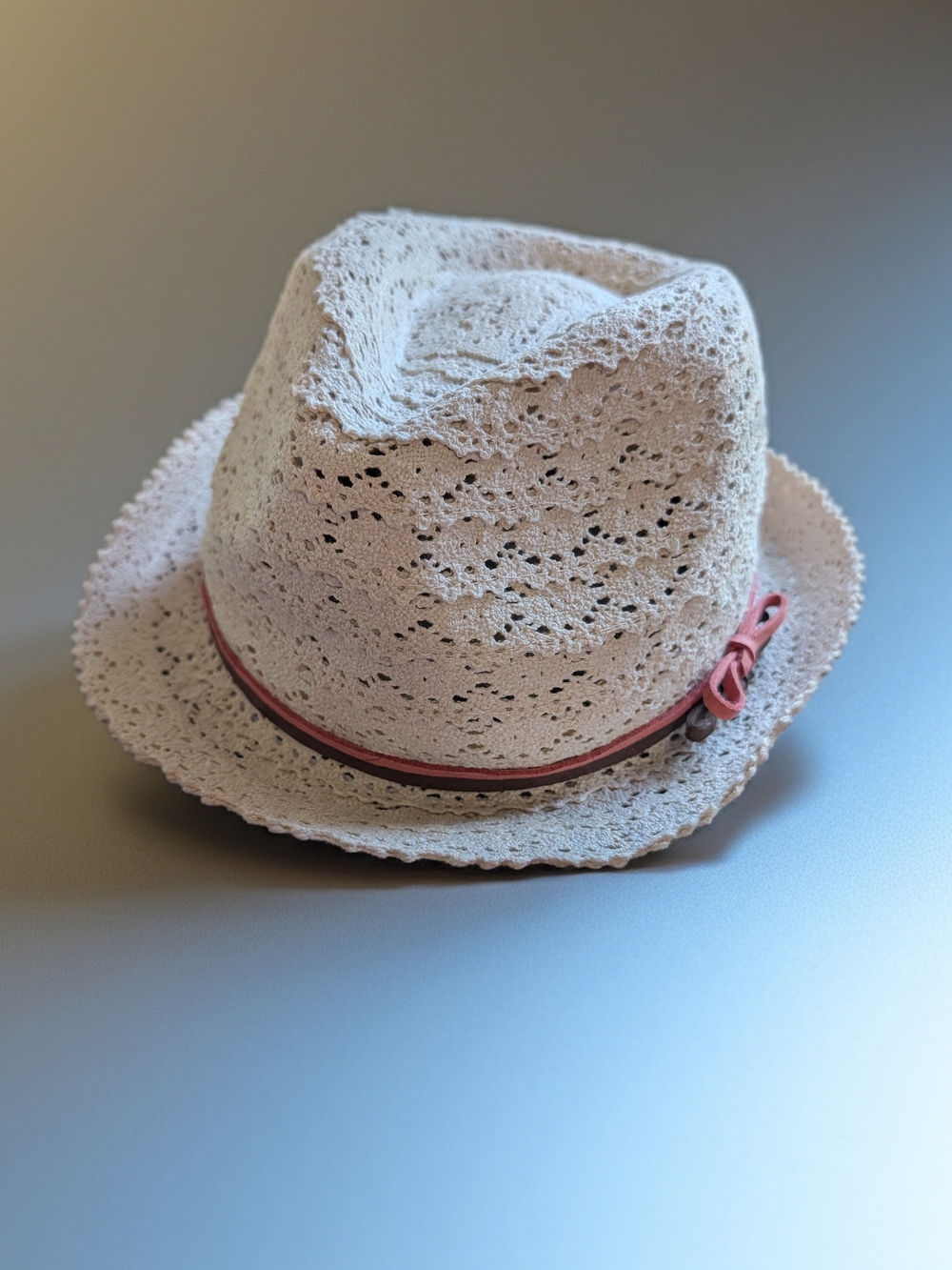 Charlotte Russe Cream Crochet Trilby with Pink Trim and Bow Accent